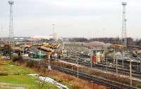 Looking north over Basford Hall Yard from the embankment of the A500 bridge. The main line is further off to the right. The box seen here will probably be swept away in the planned resignalling of the area.<br><br>[Ewan Crawford 01/02/2010]