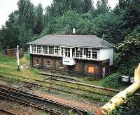 Fouldubs Junction, on the Grangemouth Docks branch, stands approximately half-way between Grangemouth Junction and the site of Grangemouth station. The signal box is seen here in June 1997. <br>
<br><br>[David Panton /06/1997]