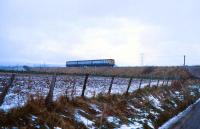 A DMU bound for Aberdeen heads west after leaving Elgin in November 1978.<br><br>[Peter Todd 27/11/1978]