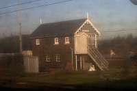 Passing glimpse through a train window of the other Eastfield - this box still stands in the extensive yards at  New England, north of Peterborough.<br><br>[Ken Strachan 28/12/2009]