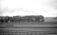 Britannia Pacific no 70002 <I>Geoffrey Chaucer</I> races north shortly after passing Kingmoor with a train in 1965.<br><br>[Robin Barbour Collection (Courtesy Bruce McCartney) //1965]