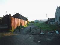 The CR Granton goods, with the old shed on the left, photographed in June 1995. View is roughly south west towards Breakwater Junction, where the line from the western breakwater trailed in from the right. Part of Granton gas works can be seen in the background beyond the roof of the shed.<br><br>[David Panton /06/1995]