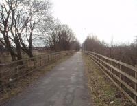 Looking towards Preston on the trackbed of the Longridge branch at the site of Red Scar exchange sidings near Ribbleton. This is the spot where David Hindle took his photo from the cab of LMS 8F 2-8-0 48546 while it shunted there in 1968. [See image 25682]. The trackbed can be cycled or walked from here down past the old Ribbleton station and on towards Deepdale. <br><br>[Mark Bartlett 08/02/2010]