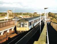 For some years slam-door DMUs in the Edinburgh area were confined to <br>
peak hour workings on the Fife and Bathgate lines. It is now September 1999 and their demise is only a couple of months away in the cascade caused by the introduction of Class 170s. The 117s' poor reliability towards the end was meat for the press: a fitter riding on every train, we were told. 117 313 is seen at Glenrothes with Thornton in the evening forming the 1638 from Waverely which was a regular 117 working. <br>
<br><br>[David Panton /09/1999]