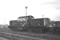 Clayton D8612 waits to depart from Millerhill Yard with the 14.58 trip freight to the Royal Navy's Royal Elizabeth Depot at Dalmeny on 5 November 1969, with an additional brake van attached for the benefit of members of the Edinburgh University Railway Society. <br><br>[Bill Jamieson 05/11/1969]