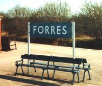 The enamel run-in board and bench facing the trackless platform at Forres in April 1980.<br><br>[David Panton 03/04/1980]