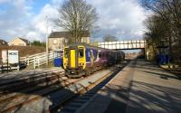 A Kirkby to Manchester Victoria service in the hands of 156460 sets off from Rainford Junction east towards Wigan on 10 February 2010. <br>
<br><br>[John McIntyre 10/02/2010]