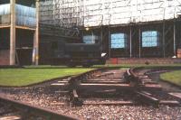 A Barclay 0-4-0ST stands out of use in the gathering dusk at Braehead power station in November 1970. This large coal-fired power station, built after WWII, was closed and demolished in the early 1990s.<br><br>[Colin Miller /11/1970]