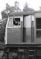 The driver of 26013 wearing local headgear at Kyle of Lochalsh in 1977. [Editor's note: All 28 alternative captions that can be applied to this photograph (none of which is printable) have now been received, thank you.]  <br><br>[Bill Roberton //1977]