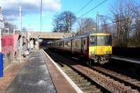 The 14.15 Glasgow Central to Ardrossan (318 266) runs into Lochwinnoch on 12 February 2010.<br><br>[Colin Miller 12/02/2010]