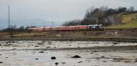 GBRf 66728 and a practise load of two class 325 mail trains returning east towards Glasgow along the banks of the Clyde having been on a driver training run to Fort William.<br><br>[Ewan Crawford 14/02/2010]