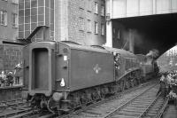 A4 no 60009 <I>Union of South Africa</I> + Black 5 no 44997 attracting attention at Aberdeen on 25 March 1967. The pair had just brought in the 18 coach <I>Grand Scottish Tour No 1</I> from Perth via Forfar and were in the process of handing over the train to diesel power for the next leg of the journey to Aviemore.<br><br>[Robin Barbour Collection (Courtesy Bruce McCartney) 25/03/1967]