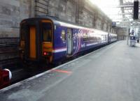 Edinburgh bound 156477 awaits departure from platform 1 at Glasgow Central on 17 February.<br><br>[John Steven 17/02/2010]