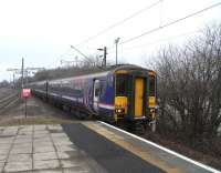 No, not a replacement diesel service pulling into Dumbarton East, but<br>
the morning Up West Highland service on its way through after the stop at Dumbarton Central. At Crianlarich the 156 unit which left Oban at 0811 was joined at the rear by the 0603 from Mallaig. <br>
<br><br>[David Panton 17/02/2010]