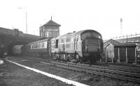 The unusual sight (in this part of the world at least) of NBL type 2 no D6102 passing St Margarets signal box hauling ecs. The photograph was taken on the afternoon of Saturday 28 February 1970 and the stock is that of a football special from the west of Scotland which had brought fans to Edinburgh for the Hibs v Rangers match at Easter Road (an entertaining 2-2 draw I understand). [See image 37779]  <br>
<br><br>[Bill Jamieson 28/02/1970]