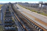 Looking west along the former guided busway at Saughton on 21 February 2010, with track laying for the new tram system well underway.<br>
<br><br>[Bill Roberton 21/02/2010]