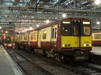 314213 at Platform 8 of Glasgow Central waiting to depart with a service for Newton on 6 February.<br><br>[Graham Morgan 06/02/2010]