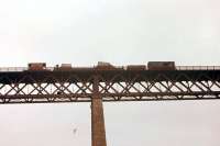 A class 08 edges a 'painters train' across the Forth Bridge in July 1961.<br><br>[Frank Spaven Collection (Courtesy David Spaven) 16/07/1961]