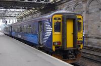 Saltire liveried 156 502 on arrival from Glasgow Central at Edinburgh Waverley on 23 February 2010.<br><br>[Bill Roberton 23/02/2010]