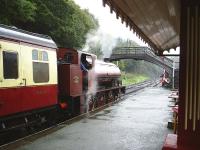 0-6-0ST <I>Cumbria</I> waits to leave Haverthwaite on 5 October 2006 in bucketing rain.<br><br>[Colin Miller 05/10/2006]