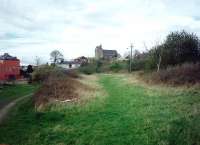 Site of the former goods yard at Kirkliston photographed in April 1995. Note the surviving yard lamp. <br><br>[David Panton /04/1995]