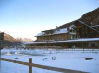 View over the site of the old station at St Anton in December 2009. Note that the station building still stands, although it is now a restaurant owned by the Hotel Post in the background. [See image 27884] showing the original station from a similar viewpoint.<br><br>[Alastair McLellan /12/2009]