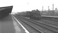 An unidentified Black 5 takes the down fast line through Hillington West in August 1963. <br><br>[Colin Miller /08/1963]