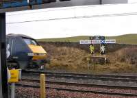 A northbound ECML service passes the border sign at Marshall Meadows on 27 February 2010. <br>
<br><br>[Bill Roberton 27/02/2010]