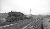 Ivatt 2-6-0 no 43028 photographed just north of Riddings Junction on 28 November 1964 with a short freight off the Langholm branch.<br><br>[Robin Barbour Collection (Courtesy Bruce McCartney) 28/11/1964]