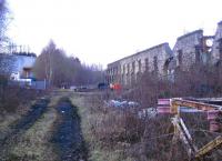 Looking North along the route of the avoiding lines at Perth in February 2010. Rowntrees siding formerly ran through a gate to the warehouse on the left.<br>
<br><br>[Gary Straiton 27/02/2010]