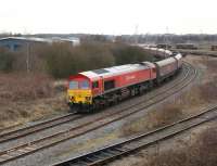 DBS 59206 hauls a trainload of coal out of Warrington yard towards Arpley Junction on 3 March 2010. Once through the junction the locomotive will run round its train for the second time before setting off west towards Fiddlers Ferry power station.<br>
<br><br>[John McIntyre 03/03/2010]