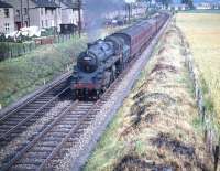 BR Standard class 4 no 76109 off Thornton Junction shed photographed with a Fife train from Edinburgh Waverley in the summer of 1959. The 2-6-0 has recently turned north at Saughton Junction and is now heading past Broomhall bound for the Forth Bridge and home.<br><br>[A Snapper (Courtesy Bruce McCartney) 25/07/1959]