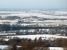 A Class 67 hauled freight drifts south through the site of Scorton station, as seen from local hill <I>Nicky Nook</I>.  Behind the train the Fylde plain stretches out towards Pilling, with Morecambe Bay beyond.<br><br>[Mark Bartlett 09/01/2010]