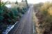 Looking west to Hereford at the closed Ashperton station. There is still a station building to the left and is that the edge of the platform amongst the undergrowth?<br><br>[Ewan Crawford 31/01/2010]