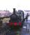 <I>Excuse me, but isn't this a record...  </I>Layerthorpe station, York, on the Derwent Valley Light Railway, in 1979. Worsdell ex-NER Clas E1 (LNER Class J72) no 69093 <I>Joem</I> takes on water via the platform hosepipe. Some 113 examples of this sturdy and reliable class were built in 9 batches over an elapsed period of 53 years between 1898 and 1951, a record production span for a British steam locomotive. <br><br>[Peter Todd ../../1979]