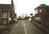 Looking south across the LC at Longforgan on 15 March 1999. The former station building stands on the left.<br><br>[David Panton 15/03/1999]