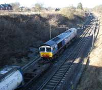 DRS 66414 heads north near Bay Horse on the WCML with an Intermodal service on 4 March 2010.<br>
<br><br>[John McIntyre 04/03/2010]