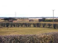 Bridge remains south of Gretna looking towards the Solway Firth. The bridge was part of the private railway system serving the enormous wartime factory complex that stretched from Eastriggs in the west through Gretna and across the border to Longtown in the east.<br><br>[Bruce McCartney 06/03/2010]