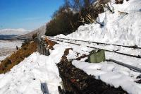 This was the site of arguably the worst avalanche onto the West Highland Railway from Beinn Odhar. I staggered up from the West Highland Way (which was also blocked). I couldn't see the view, this was one of those <i>I'll try holding the camera really high and hoping for the best</i> shots. The view looks towards Beinn Dorain which is partly obscured by trees.<br><br>[Ewan Crawford 08/03/2010]