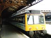 There aren't many bays with a platform at both sides, but Platform 18 at Waverley is one such. It is largely academic now as the doors are activated on only one side (the right, as seen here) in order to ensure customers are channelled through the ticket barriers. However with old DMUs there was of course no 'centralised locking' and you had the small privilege of getting out either side. Photographed on 20 May 1995 when I perceived these 117s to be a doomed hangover, though in fact they lasted for another 5 years. <br>
<br><br>[David Panton 20/05/1995]