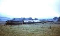 A <I>Peak</I> type 4 heads north on the Waverley route through Steele Road in November 1968 and accelerates towards Riccarton Junction with an Edinburgh train.<br><br>[Bruce McCartney /11/1968]