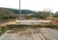 End of the road at Penmanshiel. View north west in March 2010 showing the old alignment of the A1 trunk road now cut by the rerouted ECML crossing the centre of the picture. The present day A1 can be seen in the background and the western slope of the hill through which the abandoned Penmanshiel tunnel once ran is on the far right.  <br>
<br><br>[John Furnevel 08/03/2010]