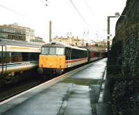 A Virgin Trains service to Birmingham New Street calls at Haymarket in February 1999 behind 86 258 <I>Talyllyn</I>.<br><br>[David Panton /02/1999]