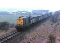 An EE Type 1 with a Bedlay Colliery - Ravenscraig coal train, thought to have been photographed in the late 1970s. The train is running south from Glenboig Level Crossing towards Garnqueen South Junction. The view is from the Caledonian Railway's Hayhill Branch (Gartcosh Junction to Garnqueen North Junction).<br><br>[Alastair McLellan //]