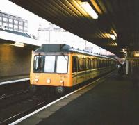 Scene at Haymarket in January 1998 as 117 313 calls at platform 2 on its way to Cowdenbeath.Then, and for several more years, there was no Platform 0, with just the wall behind Platform 1 in the background giving the station a rather hemmed-in look compared with today. [See image 17678] <br>
<br><br>[David Panton /01/1998]