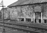 The fine notice board giving instructions for working the Kirkcaldy Harbour branch, photographed at harbour branch junction in 1984, just after closure.  It reads:   <i>B R --- Working of Kirkcaldy Harbour Branch --- Notice to staff --- Before being uncoupled from the  engine, or from each other, wagons must be at a dead stand and  properly 'secured'.  No wagons are to be uncoupled except when the catch-point and choke-block are closed. --- Fly shunting is strictly prohibited --- 7.2.08 --- By Order.</i><br><br>[Bill Roberton //1984]