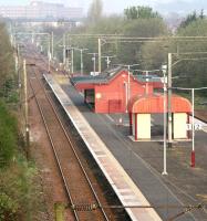 Morning view over Kings Park station on 15 April 2007, looking west from Kingsbridge Drive. The large building on the horizon is Cathcart House, headquarters of Scottish Power, although plans are afoot to relocate operations to a new building in the city centre.<br><br>[John Furnevel 15/04/2007]