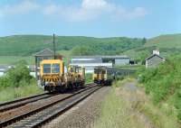 In the loop; a trolley out from Stranraer waits for a southbound Sprinter to pass the closed station. The signalman swaps hoops with the driver. This view was from early summer in 1989, since then the loop has been taken out and box removed.<br><br>[Ewan Crawford //1989]