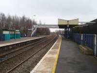 Southerly view along Whitchurch station with the former northbound bay extant to the right of the platform fencing. The short over platform canopy that protected passengers alighting at the buffer end of the bay still exists to serve its purpose. <br><br>[David Pesterfield 23/03/2010]