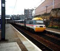 A 125 in BR InterCity livery at Haymarket Platform 4 in April 1995.  If you're wondering what it is that has changed that blank-faced building on Distillery Lane has been replaced with flats.  I hope residents appreciate the view (and sounds).<br><br>[David Panton /04/1995]